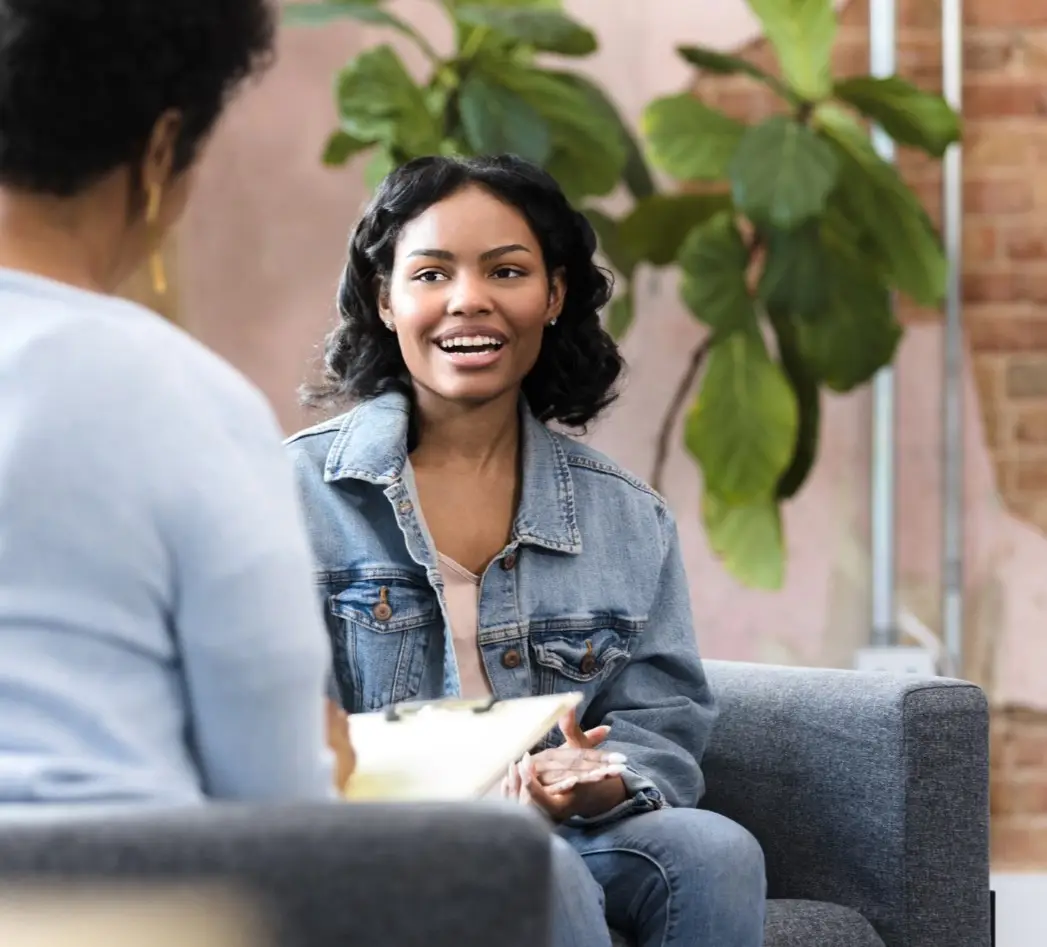 The smiling, cheerful teenage girl clasps her hands and tells the unrecognizable female counselor all about herself.
